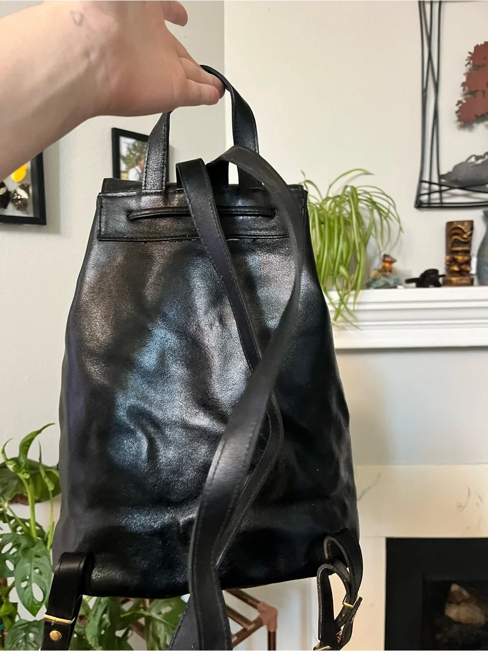 JJs House Black Leather Drawstring Flap Backpack